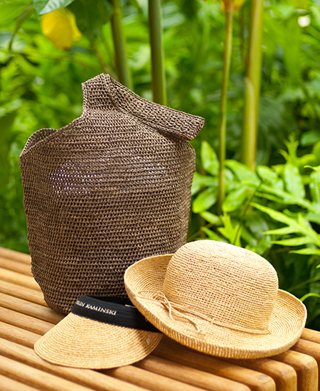 Helen Kaminsky weave visor, hat, and brown weave shoulder bag at Accents, Moana Surfrider