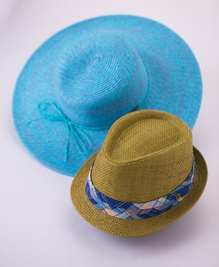 two weave hats by Chapel Hats, one blue wide brim, and one brown bowler