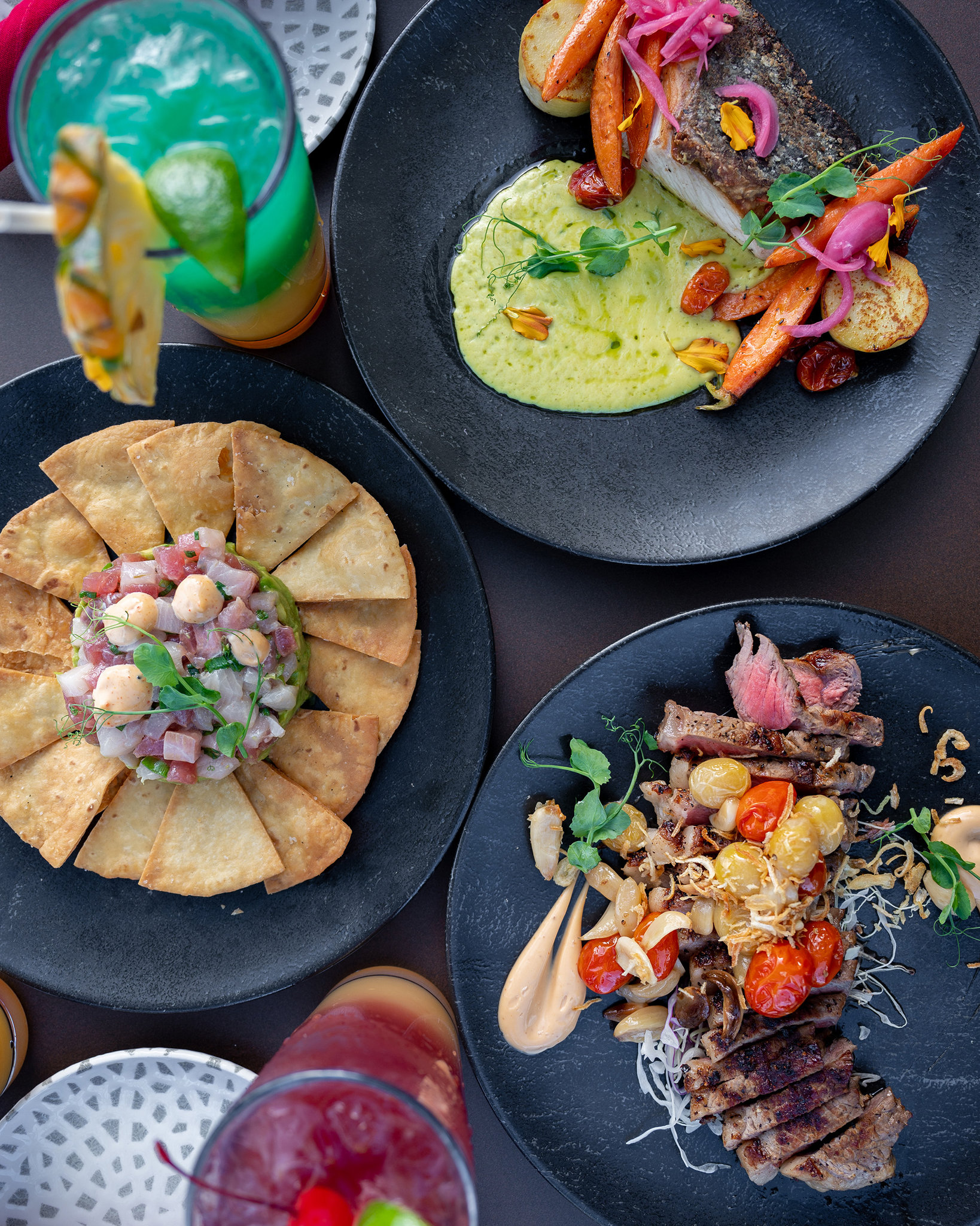 poke nachos and grilled steak with two drink cocktails at RumFire at the Sheraton Waikiki